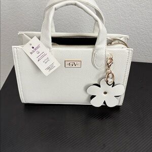 White Handbag with Flower Charm